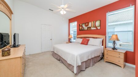 Master bedroom with king bed and ensuite bathroom.