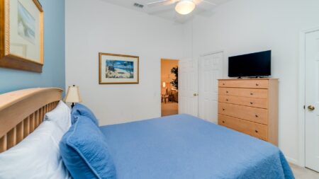 Outward view of bedroom 2 with TV.