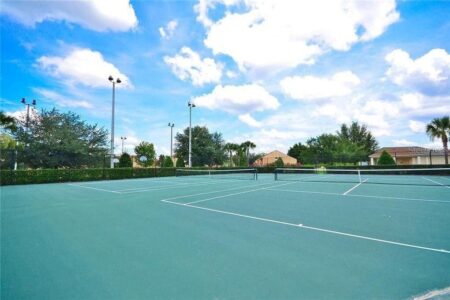 Image of floodlit tennis courts