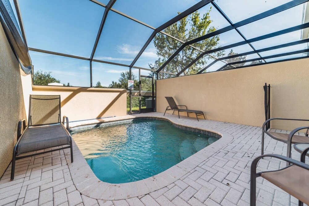 Private outdoor terrace with splash-pool and poolside furniture. No rear neighbours so very private.