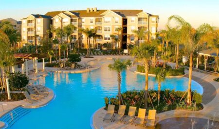 Windsor Hills pool and sun loungers with condos in background