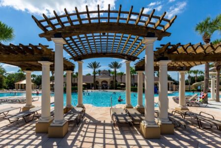 Sun loungers and shaded area at pool