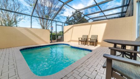 West facing splash pool with poolside furniture