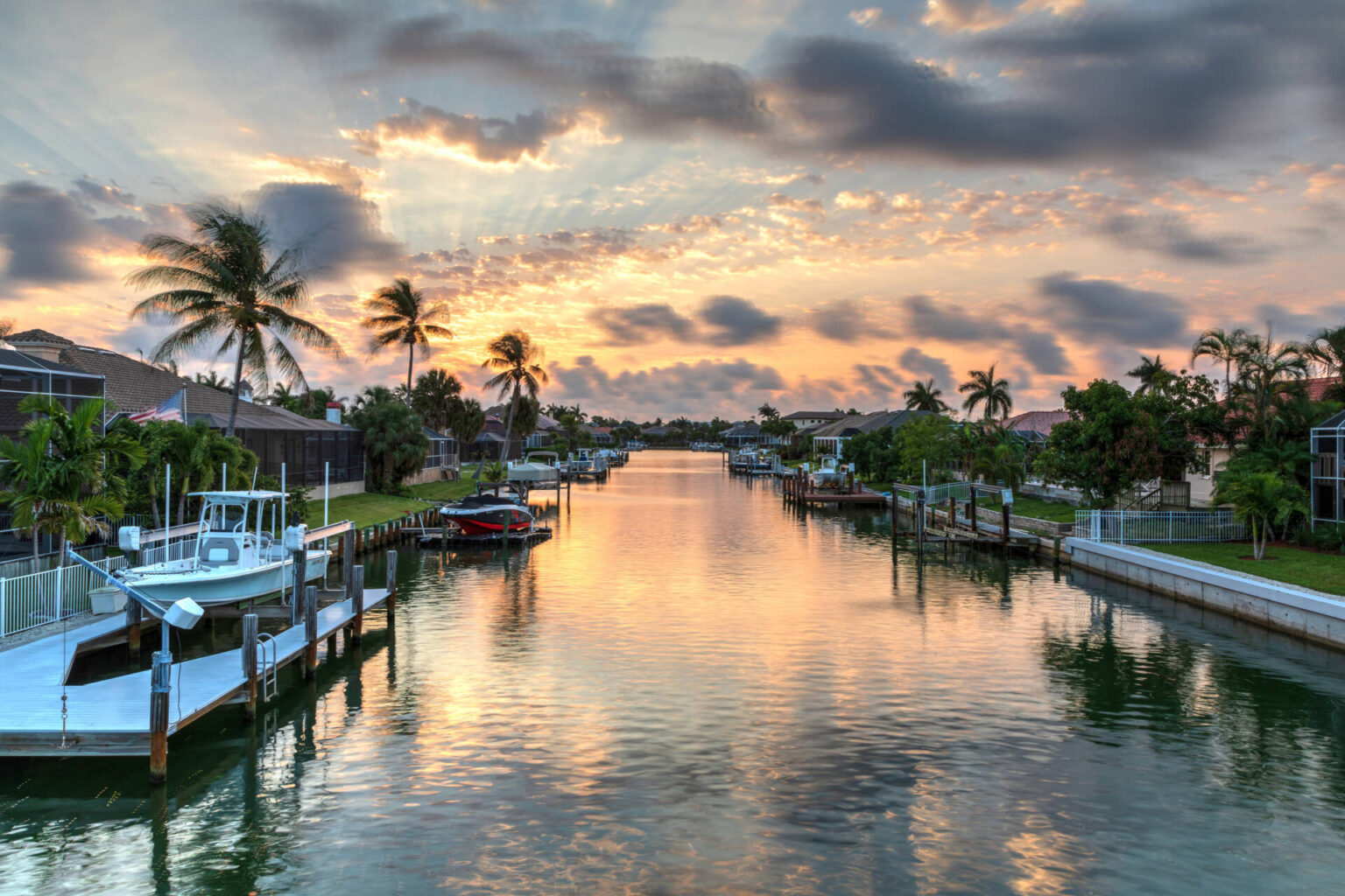 Holiday villas on Marco Island canal that leads out to Gulf of Mexico